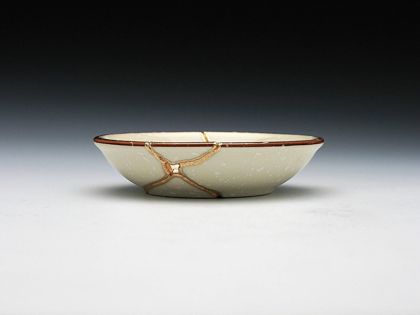 Small Beige Kintsugi Plate with Bird Image Kintsugi Reborn