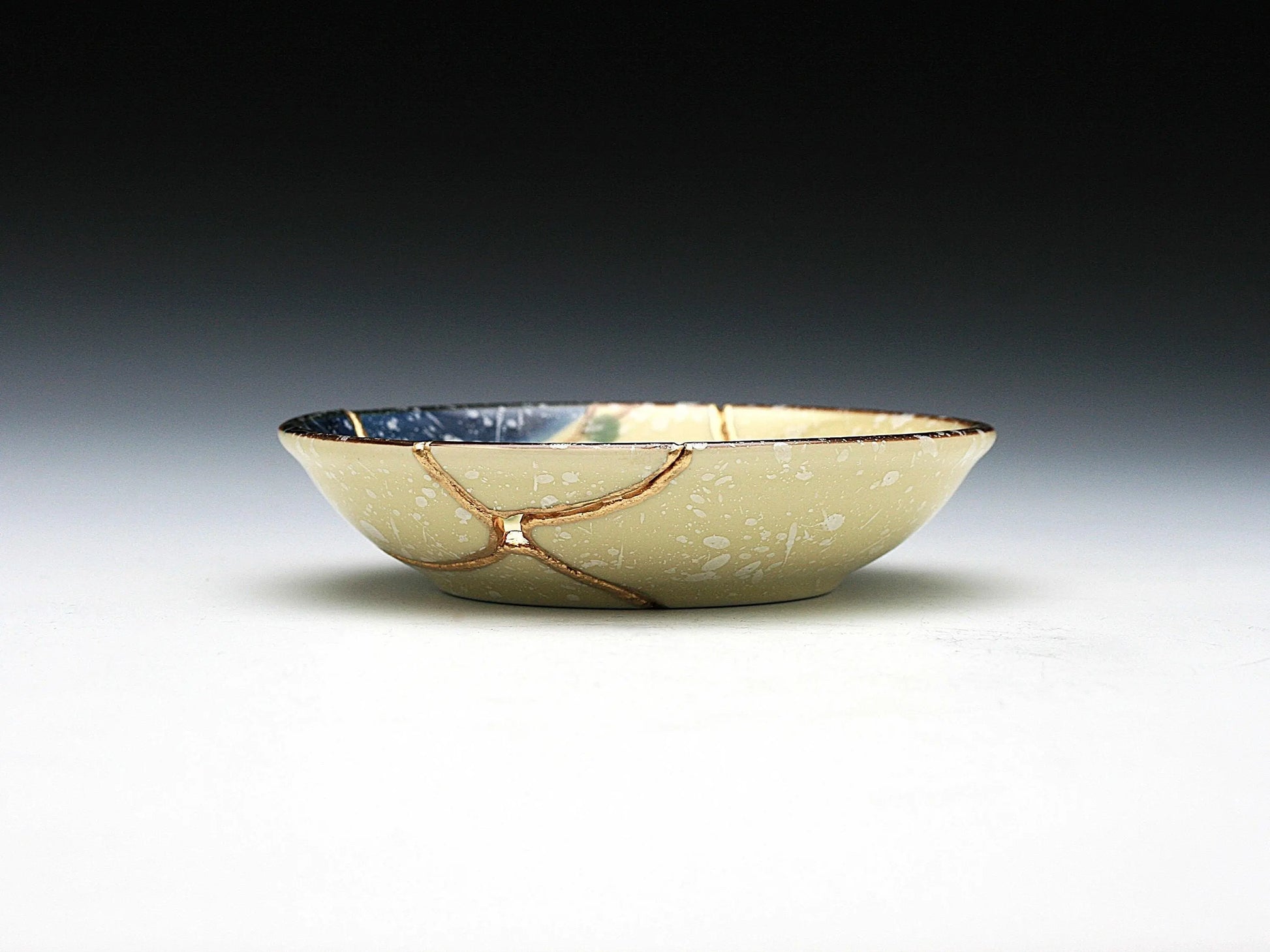 Small Beige Kintsugi Plate with Red and Yellow Flowers Kintsugi Reborn