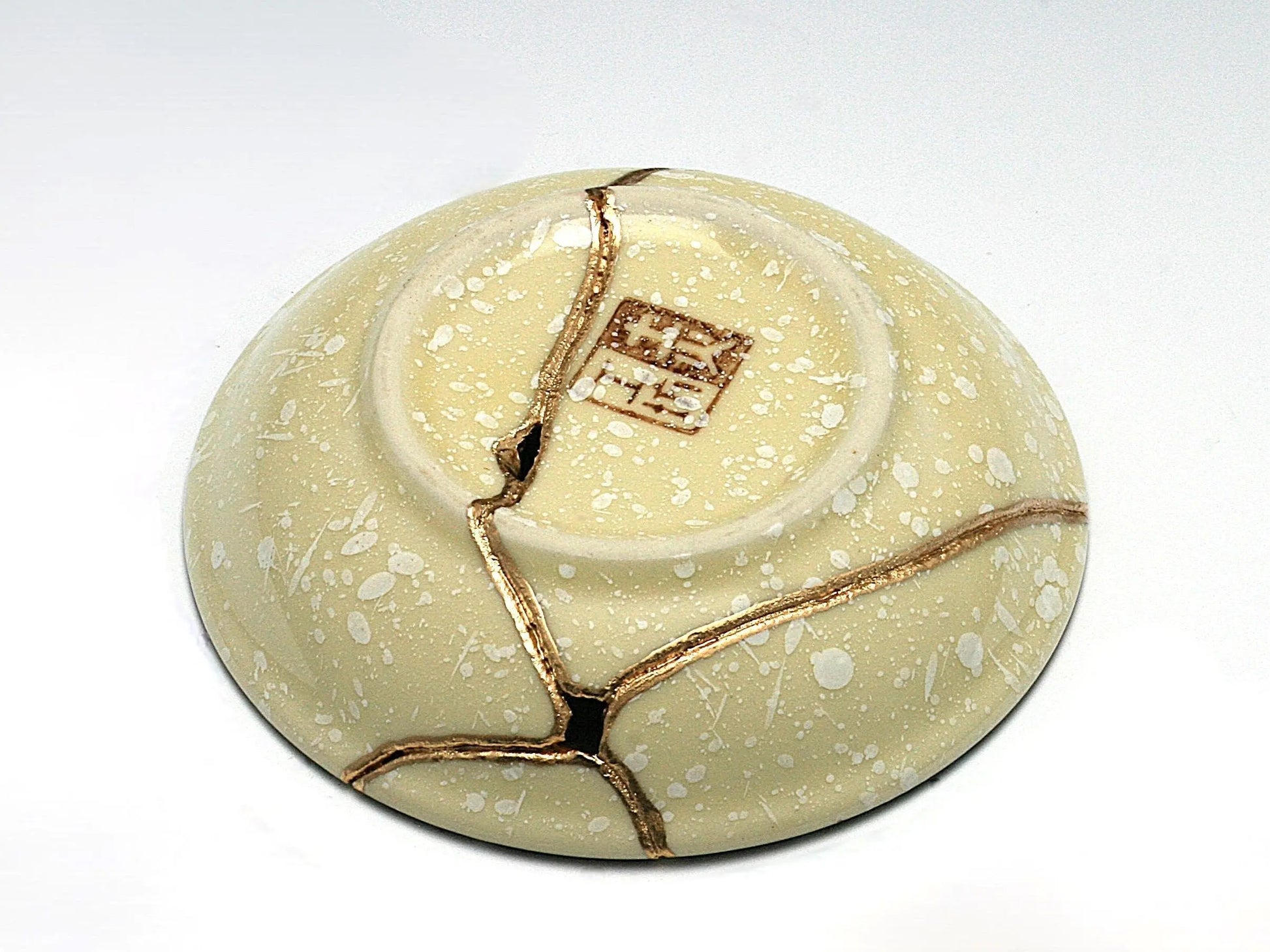 Small Beige Kintsugi Plate with Red and Yellow Flowers Kintsugi Reborn